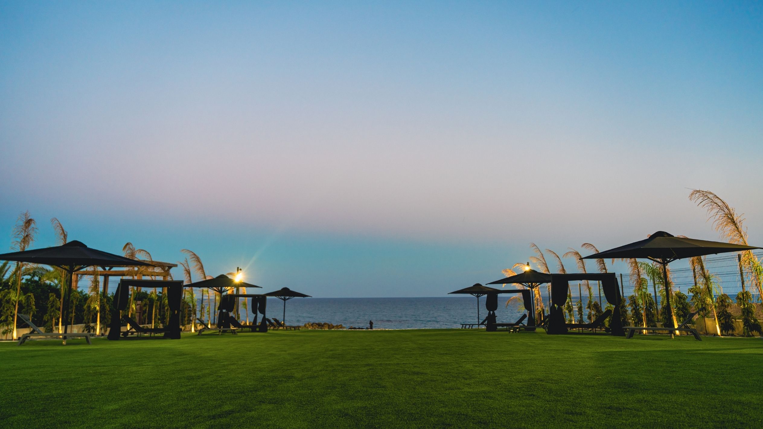 Outdoor relaxation spaces at NOE Suites overlooking the Mediterranean Sea
